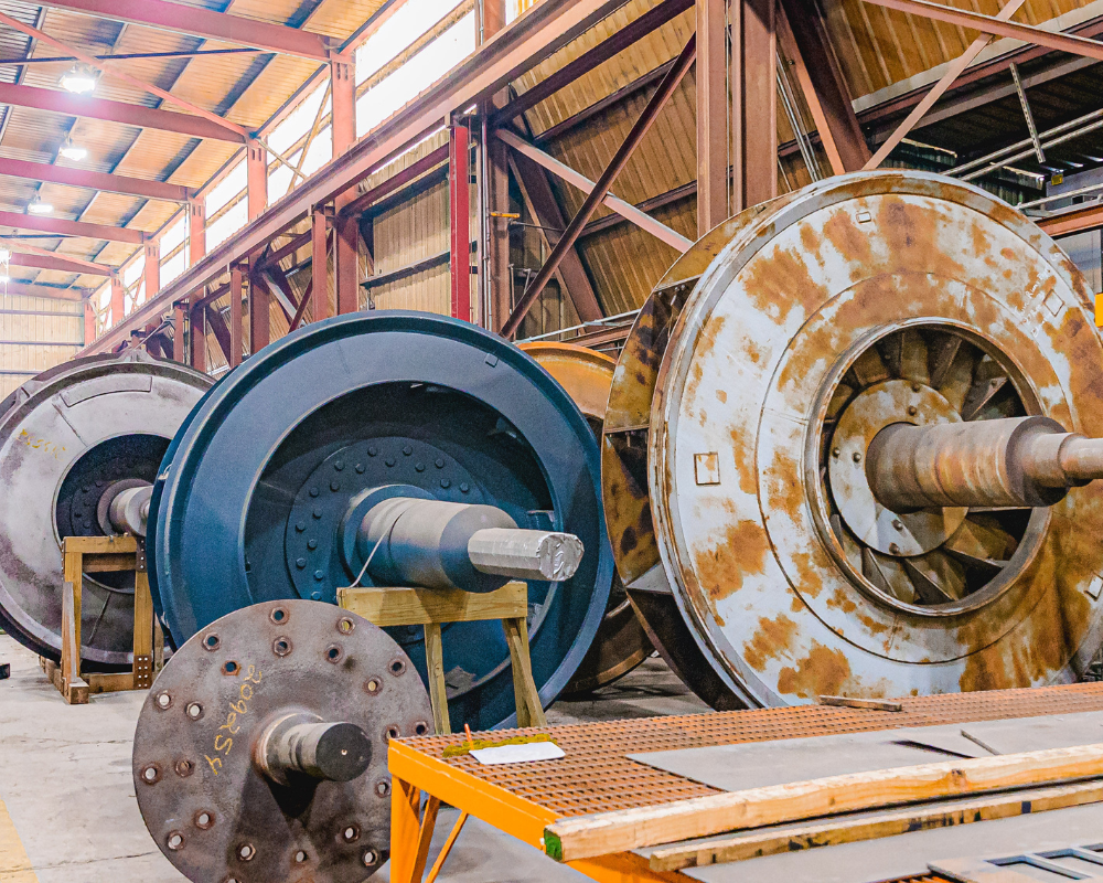 large fans sitting in a warehouse